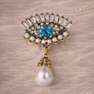 Azure Eye of Elegance Gold Brooch